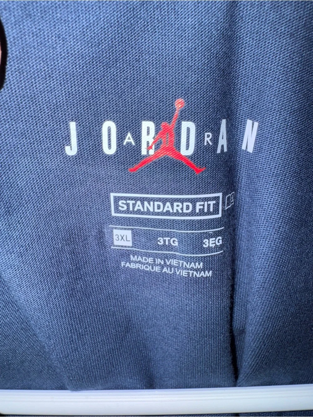 Jordan Men’s Navy Short Sleeve PSG Logo Tee with Red Jumpman